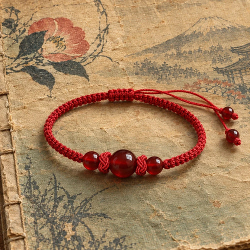 Bracelet AKA rouge sur papier japonais ancien